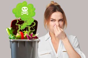 donna naso tappato e cestino puzzolente della spazzatura